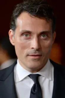 Rufus Sewell como: Parker