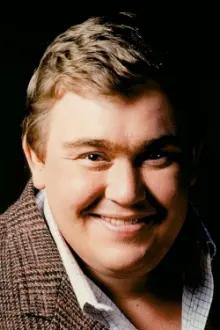 John Candy como: Self (archive footage) (uncredited)