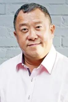 Eric Tsang como: Ng Kuai-Tak