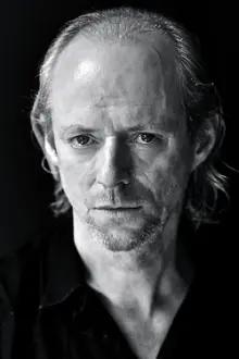 Ned Dennehy como: Tommy