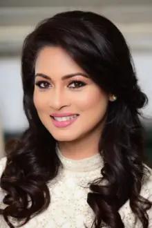 Pooja Umashankar como: Pooja