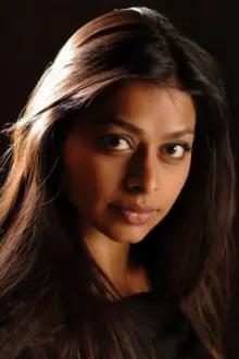 Ayesha Dharker como: Amrita H. Pal