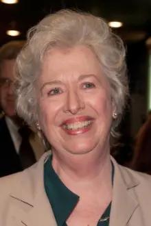 Polly Holliday como: Mrs. Wooster