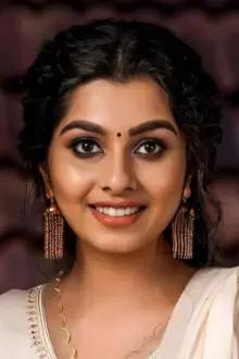 Niranjana Anoop como: Ananya Viswanath