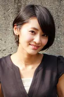 Minami Tsukui como: Yōko Minato / Kamen Rider Marika
