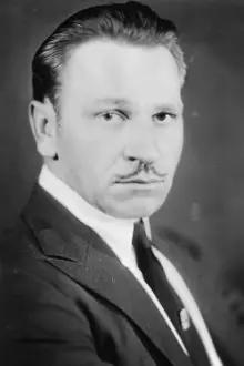 Wallace Beery como: Janitor