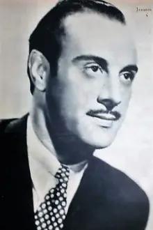 Joaquín Bergía como: Jugador de dominó