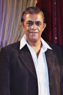 Shivkumar Subramaniam como: Ishwarlal Motilal Virani