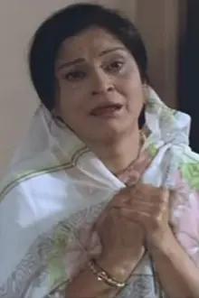 Urmila Bhatt como: Mrs. Sharda M. Agarwal