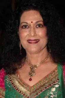 Anjana Mumtaz como: Mrs. Anand (Vicky's mom)