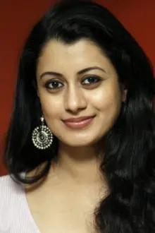 Reenu Mathews como: Madhumita Krishnan