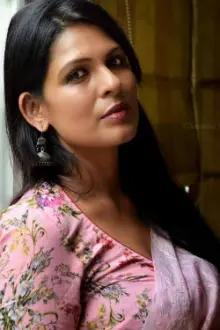 Ekavali Khanna como: Nandini, Sen's Office colleague