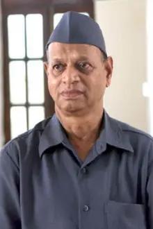Kishore Nandlaskar como: Father