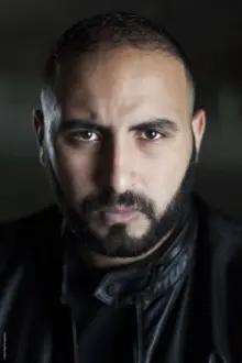 Oussama Kheddam como: Malik