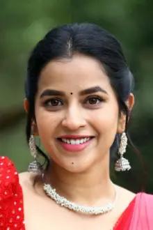 Komalee Prasad como: Varsha