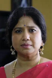 Madhumani como: Sita's Mother