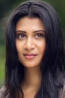 Parineeta Borthakur como: Sharmistha Bose