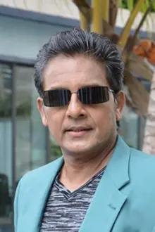 Mukesh Hariawala como: Bar Owner