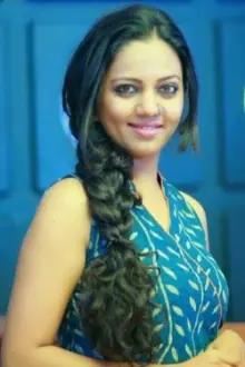 Neha Joshi como: Kamali
