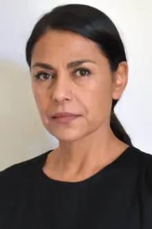 Claudia Goytia como: Miguel's mother