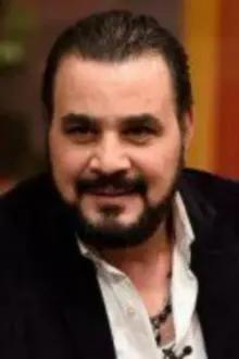 Magdy Kamel como: Gamal