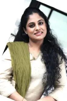 Asha Aravind como: 