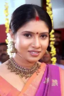 Sanghavi como: Anitha Raghavan