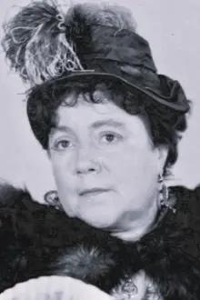 Georgette Anys como: Mrs. Angèle